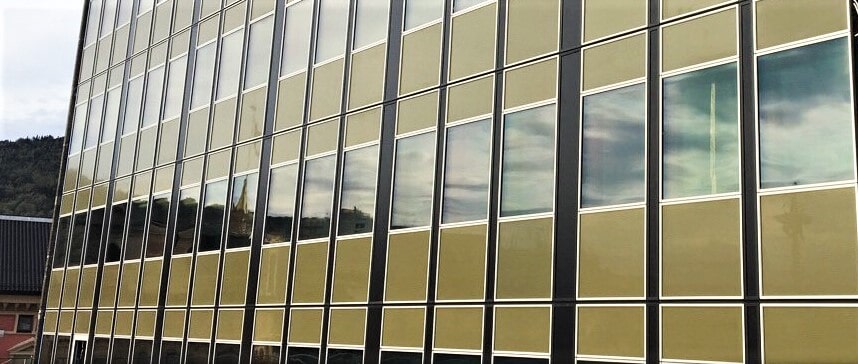 The glass facade of the office building Ticon in Oslo, Norway