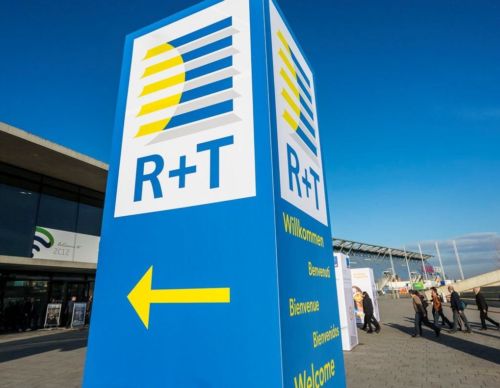 Sign for the R+T Trade Fair in Stuttgart, Germany on a sunny day.