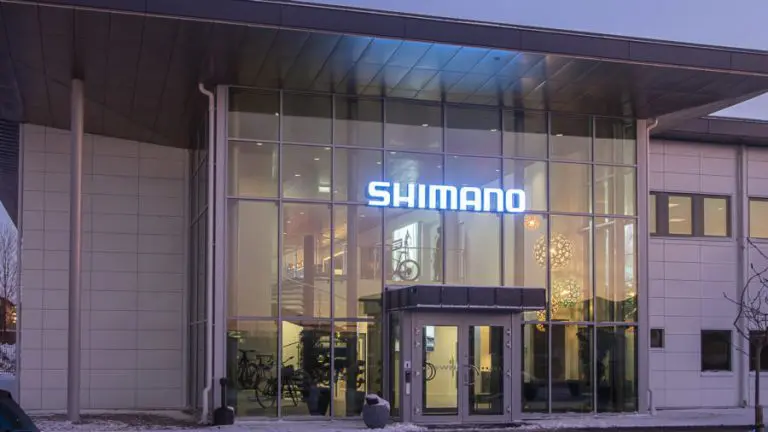 The entrance of the office building Shimano in Uppsala in the evening