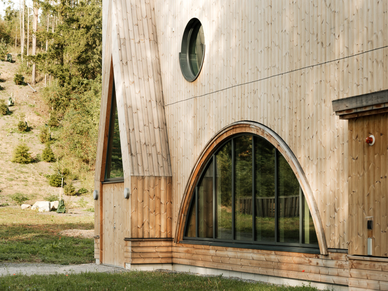 Wooden house with Converlight glass windows